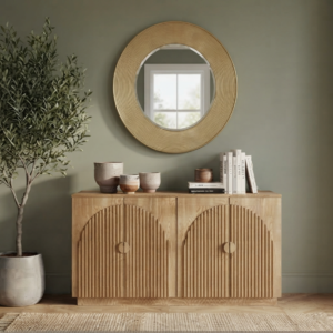 65 Inch Fluted Buffet Cabinet, Fluted wood buffet cabinet with arched doors and round mirror in a sage green entryway